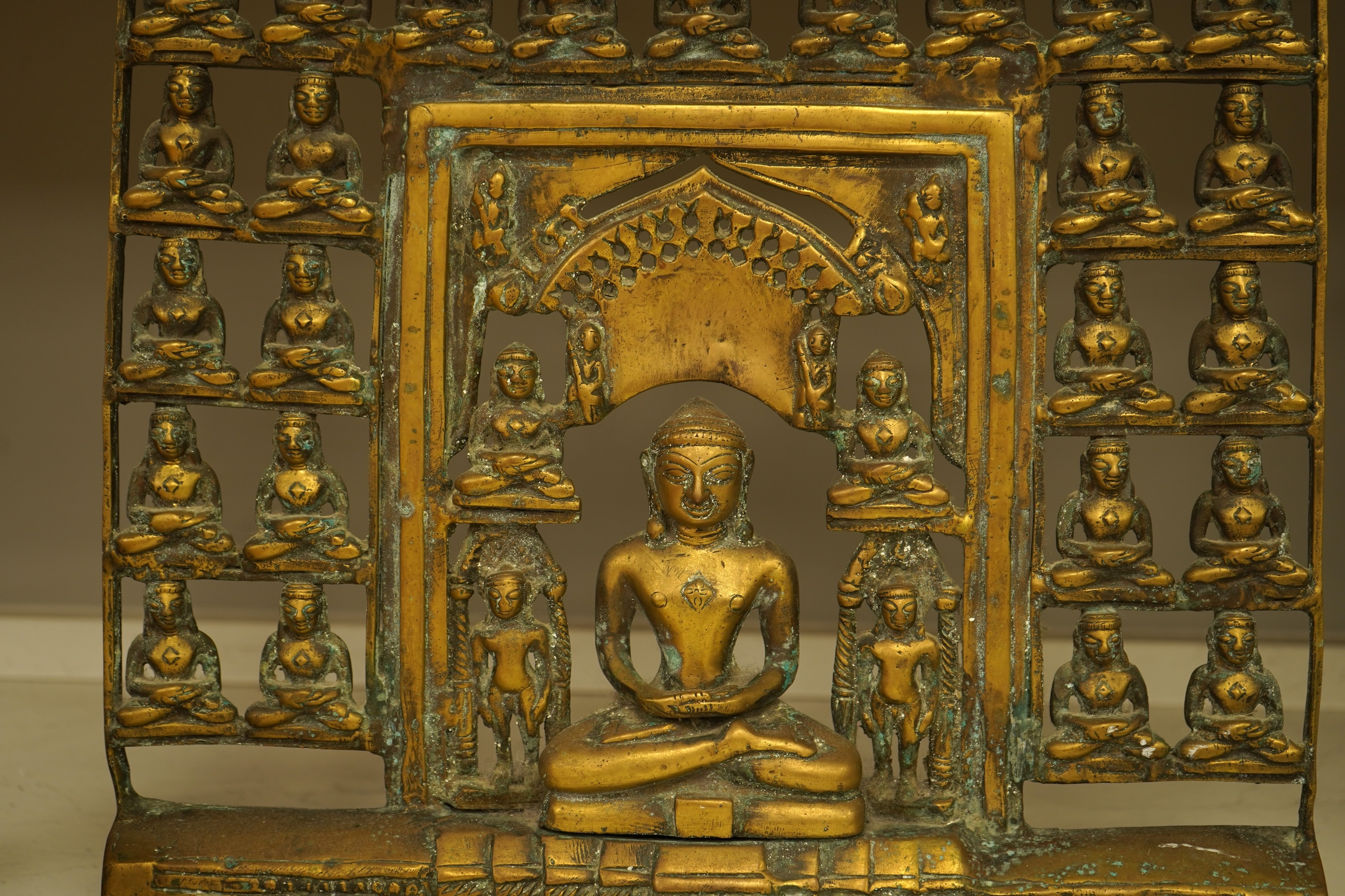 An Indian bronze temple panel with deities, 40cm high